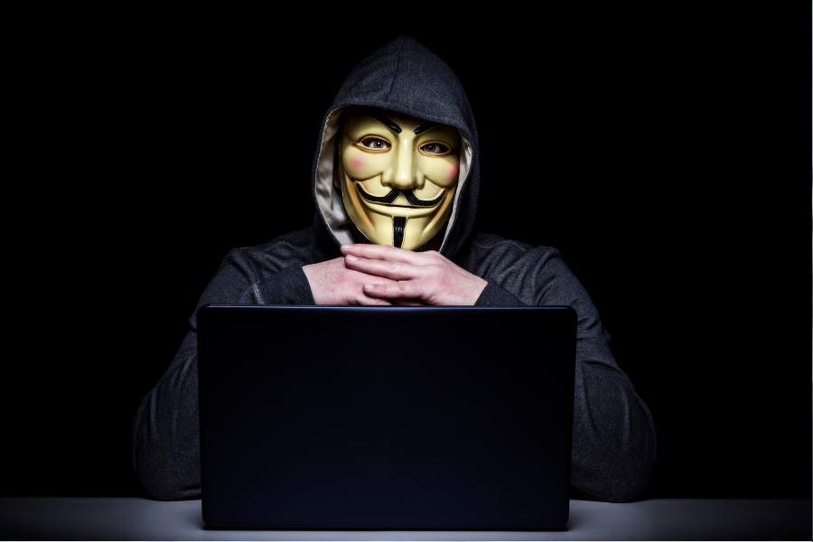 image of a hacker in a guy fawkes mask